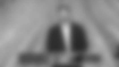 Bears offensive lineman Joe Thuney presents his speech after winning the 2025 Protector of the Year award at the 15th annual NFL Honors.