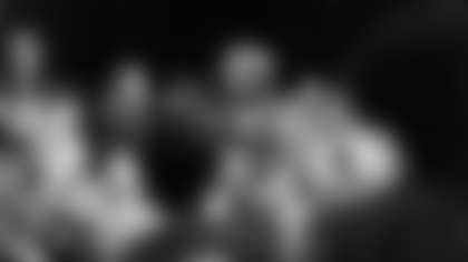 L-R: Allison Soldner (in #54 jersey), Bears community outreach manager Mia Riese, Staley Da Bear, Dr. Jenai Jenkins