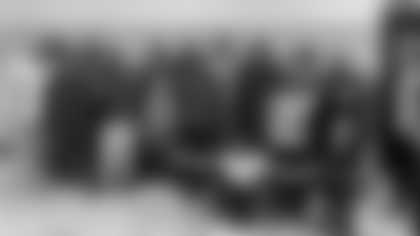 C.J. Gardner-Johnson and Nahshon Wright with Chicago Vocational Career Academy students at a BAM circle