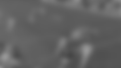 Bears quarterback Caleb Williams escapes the Giants pressure to move the chains.