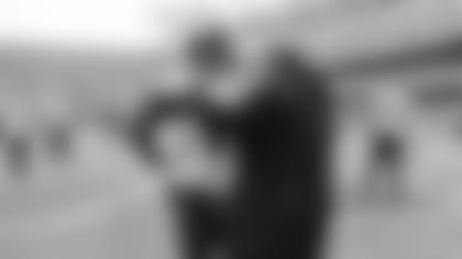 Falcons running back Cordarrelle Patterson and Kevin Warren.