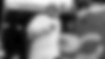 Eric Bieniemy and Kyle Monangai