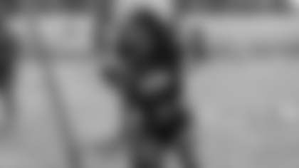 Della Jo Bear participating at the Bears youth football training camp