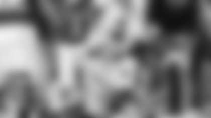 Indiana quarterback Fernando Mendoza is sacked by Miami defensive lineman Rueben Bain Jr. during the second half of the College Football Playoff national championship game, Monday, Jan. 19, 2026, in Miami Gardens, Fla.(AP Photo/Marta Lavandier)