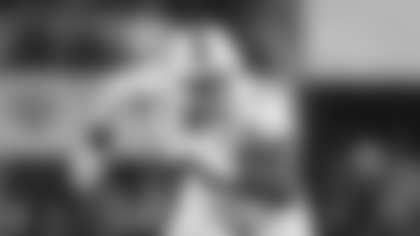 Miami defensive lineman Rueben Bain Jr. rushes in during the Cotton Bowl College Football Playoff quarterfinal game between Ohio State and Miami Wednesday, Dec. 31, 2025, in Arlington, Texas. (AP Photo/Julio Cortez)