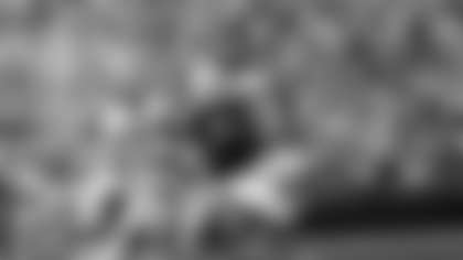 Los Angeles Rams wide receiver Jack Snow (84) is tackled by Cincinnati Bengals safety Neal Craig (42) during an NFL game Oct. 22, 1972, in Los Angeles. (Vic Stein via AP)