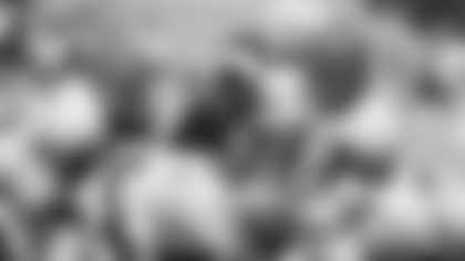 Quarterback Virgil Carter (11) of the Cincinnati Bengals hands off in 1972.   (AP Photo / Al Messerschmidt)