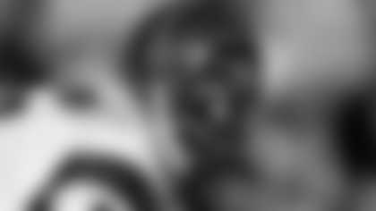 Quarterback Boomer Esiason (7) of the LCincinnati Bengals sets for play at the line of scrimmage  against the Los Angeles Raiders in an NFL division playoff game January 13, 1991 in Los Angeles.   (Al Messerschmidt via AP)