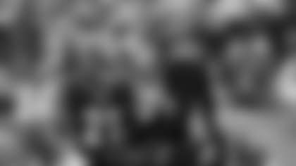 Cincinnati Bengals defensive end Carlos Dunlap (96) reacts with defensive back Darqueze Dennard (21) during an NFL football game against the New England Patriots, Sunday, Dec. 15, 2019, in Cincinnati. The Patriots won 34-13. (Aaron Doster via AP)