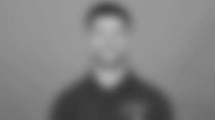 TAMPA, FL - February 16, 2026 - Quarterbacks Coach Chandler Whitmer of the Tampa Bay Buccaneers headshot taken at AdventHealth Training Center. Photo By Kyle Zedaker/Tampa Bay Buccaneers