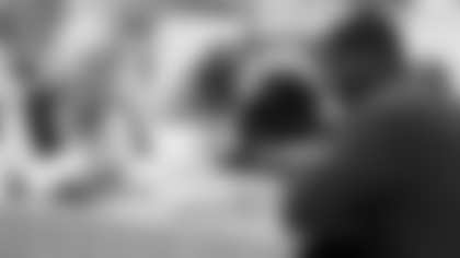 Arizona Cardinals offensive lineman Kelvin Beachum (68) meets with Scout, the artist painting his My Cause My Cleats, on Thursday, Oct 31, 2024 in Mesa, AZ.