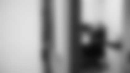 Scout Rooney works on painting the My Cause My Cleats for Arizona Cardinals offensive lineman Kelvin Beachum (68) on Tuesday, Nov 5, 2024 in Mesa, AZ.