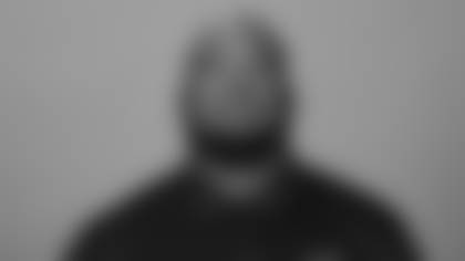 A headshot of assistant offensive line coach Chris Cook of the Arizona Cardinals in May 2024.