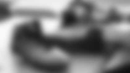 Arizona Cardinals offensive lineman Kelvin Beachum (68) meets with Scout, the artist who painted his My Cause My Cleats, on Monday, Nov 11, 2024 in Tempe, AZ.