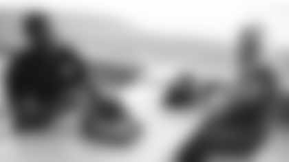 Arizona Cardinals offensive lineman Kelvin Beachum (68) meets with Scout, the artist who painted his My Cause My Cleats, on Monday, Nov 11, 2024 in Tempe, AZ.