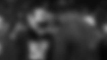 Defensive lineman Calais Campbell (right) has a pre-game chat with Darius Robinson (56).