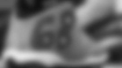 Scout Rooney works on painting the My Cause My Cleats for Arizona Cardinals offensive lineman Kelvin Beachum (68) on Thursday, Nov 7, 2024 in Mesa, AZ.