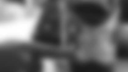 Arizona Cardinals offensive lineman Kelvin Beachum (68) meets with Scout, the artist who painted his My Cause My Cleats, on Monday, Nov 11, 2024 in Tempe, AZ.