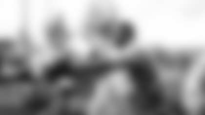 Rookie linebacker Jordan Burch takes part in the recent food distribution for needy families put on by teammates Paris Johnson Jr. and Kelvin Beachum.