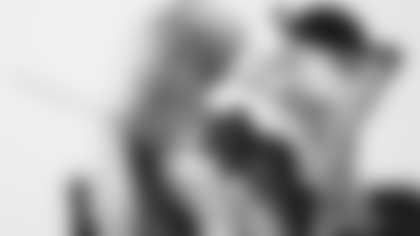 Scout Rooney works on painting the My Cause My Cleats for Arizona Cardinals offensive lineman Kelvin Beachum (68) on Tuesday, Nov 5, 2024 in Mesa, AZ.