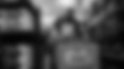 Tight end Trey McBride goes shopping with a excited friend.