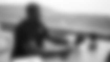 Arizona Cardinals offensive lineman Kelvin Beachum (68) meets with Scout, the artist who painted his My Cause My Cleats, on Monday, Nov 11, 2024 in Tempe, AZ.