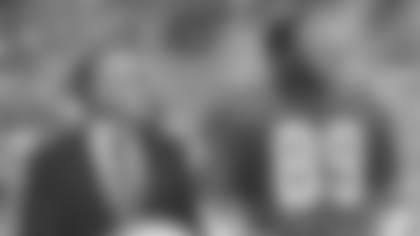 Kansas City Chiefs wide receiver Henry Marshall (89) is honored at midfield by Lamar Hunt for a record breaking catch giving him, at the time, the most career receptions of any Kansas City Chiefs wide receiver.