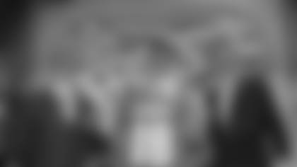 Quarterback Peyton Manning, of Tennissee, holds holds up an Indianapolis Colts jersey as he is flanked by Colts owner Jim Irsay, left, and NFL Commissioner Paul Tagliabue Saturday, April 18, 1998, in New York after being chosen by the Colts as the No. 1 pick in the in draft Saturday. (AP Photo/Adam Nadel)