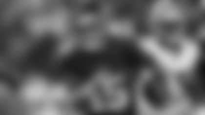 New York Giants quarterback Tommy DeVito (15) scrambles in the second half of an NFL football game against the Dallas Cowboys, Sunday, Nov. 12, 2023, in Arlington, Texas. (AP Photo/Julio Cortez)