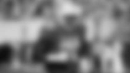 Texas' Christian Jones (70) runs off the field after a play against Louisiana-Lafayette during the second half of an NCAA college football game on Saturday, Sept. 4, 2021, in Austin, Texas. (AP Photo/Chuck Burton)