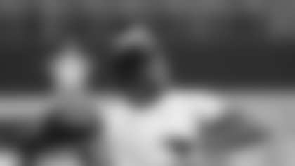 Baltimore Ravens quarterback Lamar Jackson warms up before a preseason NFL football game against the Dallas Cowboys, Saturday, Aug. 16, 2025, in Arlington, Texas. (AP Photo/Gareth Patterson)