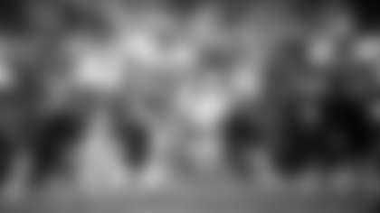 Washington Redskins cornerback Darrell Green runs upfield with an interception. The play was nullified by a penalty during the Redskins 24-7 victory over the Atlanta Falcons in the 1991 NFC Divisional Playoff Game on January 4, 1992 at RFK Stadium in Washington, D.C. (AP Photo / Al Messerschmidt)