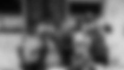 Dallas Cowboys players and cheerleaders volunteered at the Salvation Army in Dallas and Fort Worth to serve early thanksgiving meals.