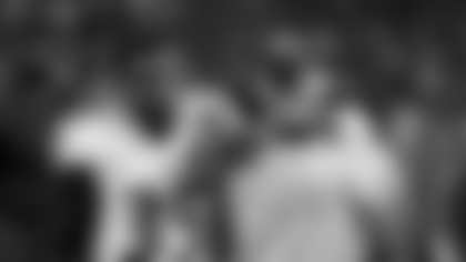 Baltimore Ravens head coach John Harbaugh, right, and Shareece Wright walk off the field after the Ravens defeated the Cleveland Browns 33-27 in an NFL football game, Monday, Nov. 30, 2015, in Cleveland. (AP Photo/David Richard)