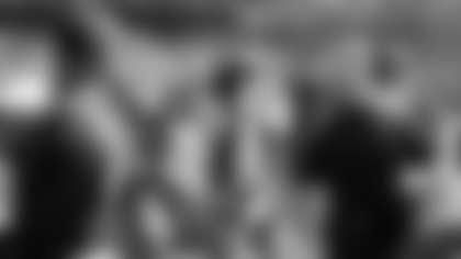 Baltimore Ravens coach John Harbaugh, right, shakes hands with Cincinnati Bengals coach Marvin Lewis after the Ravens defeated the Bengals 17-10 in an NFL football game Sunday, Sept. 7, 2008, in Baltimore. (AP Photo/Nick Wass)