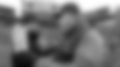 Green Bay Packers head coach Mike McCarthy talks to Baltimore Ravens head coach John Harbaugh after an NFL football game Sunday, Nov. 19, 2017, in Green Bay, Wis. The Ravens won 23-0. (AP Photo/Jeffrey Phelps)