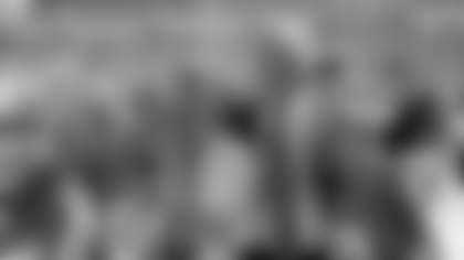 Jacksonville Jaguars owners Wayne and Delores Barr Weaver wave and pose for a photo with former cheerleaders during an NFL football game against the Arizona Cardinals, Sunday, September 20, 2009 in Jacksonville, Florida. The Cardinals won the game 31-17. (AP Photo/Paul Spinelli)