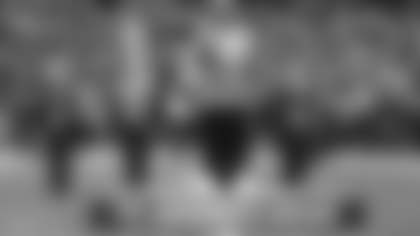 Trevor Nicholas sings the US national anthem Star Spangled Banner.