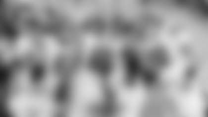 Northwestern offensive linemen Deuce McGuire (73), Evan Beerntsen (60), Jackson Carsello (65), Ezomo Oratokhai (62) and Caleb Tiernan (72) huddle against Nebraska during the first half of an NCAA college football game, Saturday, Oct. 25, 2025, in Lincoln, Neb. (AP Photo/Bonnie Ryan)