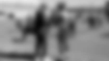 Jacksonville, Fla. — Jaguars head coach Liam Coen and cornerback Montaric Brown (30) during practice at the Miller Electric Center on November 12, 2025.