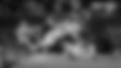 Green Bay Packers DL Lukas Van Ness sacks Chicago Bears QB Caleb Williams for a 9-yard loss during Saturday's NFC Wild Card game.