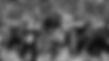 UConn quarterback Joe Fagnano (2) hands off the ball to UConn running back Oliver Lundberg Coleman (44) during the first half of an NCAA college football game against Duke, Saturday, Nov. 8, 2025, in East Hartford, Conn. (AP Photo/Jessica Hill)