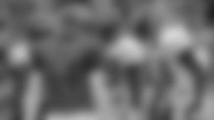 Cincinnati Bengals quarterback Andy Dalton (14) talks with receivers, from left to right, Andre Caldwell, Jerome Simpson, and A.J. Green in the huddle during a scrimmage at NFL football training camp, onFriday, Aug. 5, 2011, in Georgetown, Ky. (AP Photo/Al Behrman)