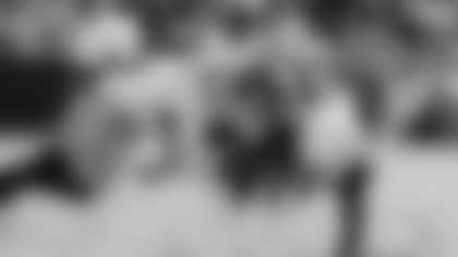 Arkansas wide receiver Raylen Sharpe carries against LSU defensive back A.J. Haulcy (13) in the first half of an NCAA college football game, Saturday, Nov. 15, 2025, in Baton Rouge, La. (AP Photo/Gerald Herbert)
