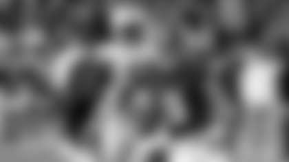 Alabama quarterback Bryce Young (9) carries the ball against Auburn during the first half of an NCAA college football game Saturday, Nov. 26, 2022, in Tuscaloosa, Ala. (AP Photo/Butch Dill)