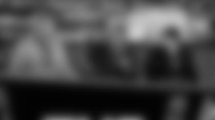 Television broadcasters Howie Long, Michael Strahan and Rob Gronkowski talk on the set before the NFC Championship NFL football game between the Seattle Seahawks and the Los Angeles Rams, Sunday, Jan. 25, 2026, in Seattle. (AP Photo/John Froschauer)