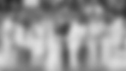 A couple dressed as a bride and groom participate in the Bad Bunny performance during halftime of the NFL Super Bowl 60 football game between the Seattle Seahawks and the New England Patriots, Sunday, Feb. 8, 2026, in Santa Clara, Calif. (AP Photo/Frank Franklin II)