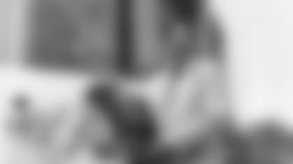 Bill George poses outside the Pro Football Hall of Fame in Canton, Ohio, on July 28, 1974, after he was inducted into the memorial institution. George played linebacker with the Chicago Bears from 1952-1965 and with the Los Angeles Rams in 1966. (AP Photo)