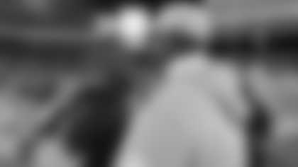 Atlanta Falcons head coach Raheem Morris speaks with Tampa Bay Buccaneers head coach Todd Bowles after an NFL football game, Thursday, Dec. 11, 2025, in Tampa, Fla. (AP Photo/Jason Behnken)