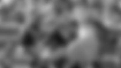 Arizona Cardinals' Carson Palmer, center, is sacked by Carolina Panthers' Kawann Short, right, and Star Lotulelei, left, in the first half of an NFL football game in Charlotte, N.C., Sunday, Oct. 30, 2016. (AP Photo/Bob Leverone)